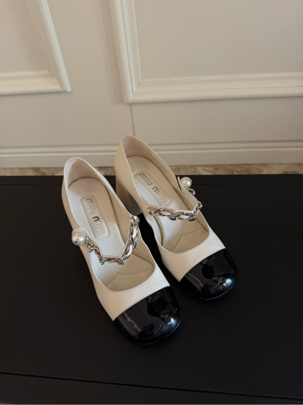 Miu Miu Two-Tone Pearl Chain Mary Jane Pumps in White and Black